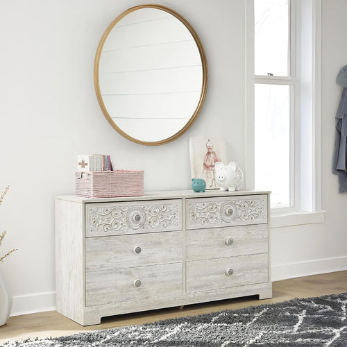Transform Your Bedroom with the Elegant Paxberry Boho Dresser in Whitewash by Signature Design by Ashley