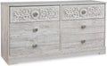 Transform Your Bedroom with the Elegant Paxberry Boho Dresser in Whitewash by Signature Design by Ashley